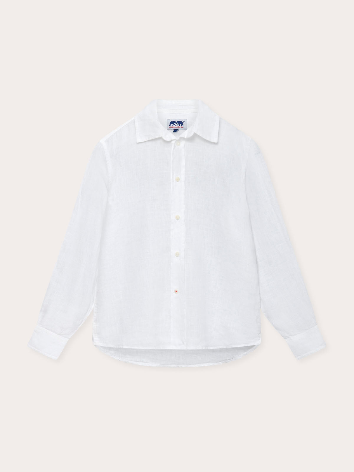 Kids white Abaco linen shirt with long sleeves, buttons, and a crisp collar.