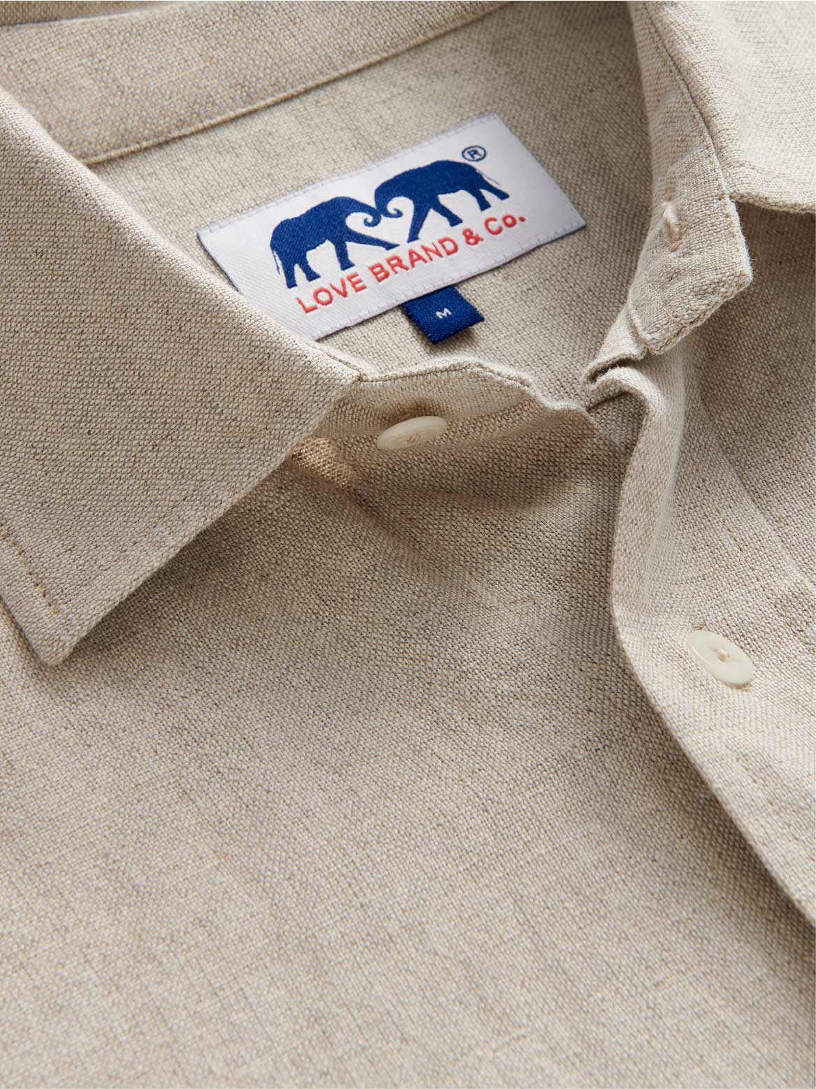 Collar view of mens ecru linen shirt.