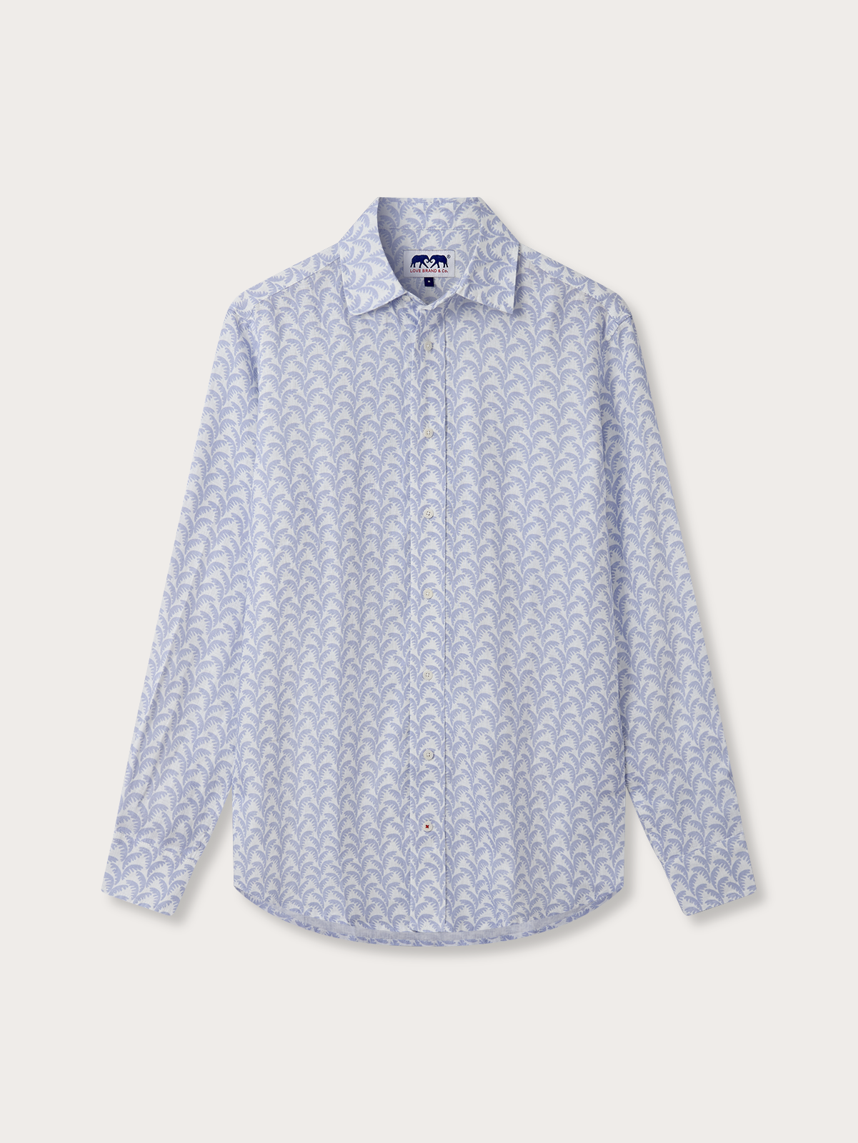Light blue patterned shirt on a light gray background