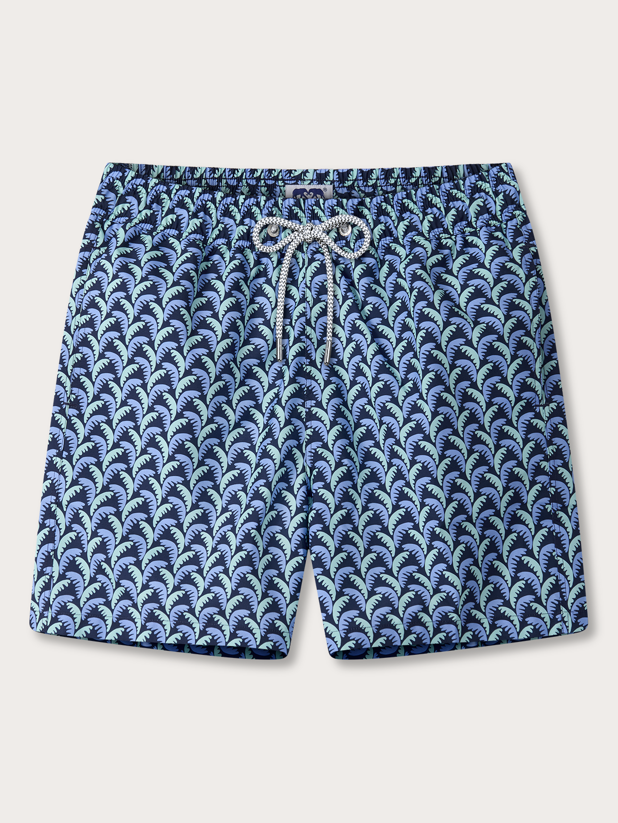 Blue patterned shorts with a drawstring on a light grey background